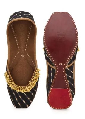 Black Geometric Print Juttis In Silk With Ghungroo Embellishment
